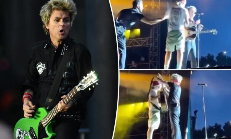 Billy Joe Armstrong de Green Day patea al fanático para jugar ‘Wonderwal’ de Ossis Billy Joe Armstrong de Green Day patea al fanático para jugar ‘Wonderwal’ de Ossis