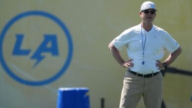 Jim Harbaug negó los comentarios después del juicio de la NCAA en Michigan.