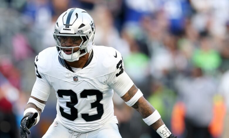 Jamal Adams abrazando el movimiento hacia el apoyador débil del lado débil Jamal Adams abrazando el movimiento hacia el apoyador débil del lado débil