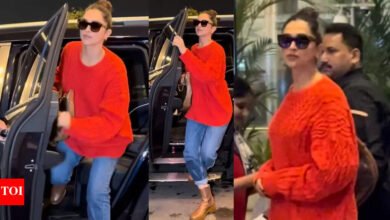 Deepika Padukone mantiene el aeropuerto fresco en suéter rojo y denim para el look; Sonriendo antes de que el estilo se detenga en el estilo Hindi Movie News