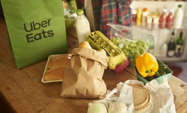 Uber informa saltos en comestibles, entregas minoristas