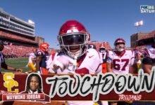 Waymond Jordan de la USC se apresuró a encontrar un patio para empatar el juego con Illinois.