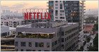 El acuerdo de Spotify para llevar podcasts de vídeo a Netflix impide que los programas se transmitan completos en YouTube; Netflix no ejecutará pausas publicitarias, pero los anuncios integrados de Spotify permanecen (New York Times)