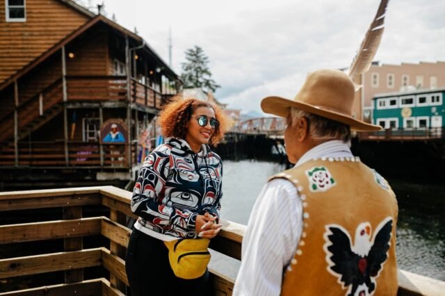 Evita-Robinson-and-Joe-Williams-Jr.-of-Where-the-Eagle-Walks-outside-of-Creek-Street_Ketchikan-Alask.jpeg