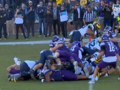 Jordan Marshall corre hacia su SEGUNDO TD, ampliando la ventaja de Michigan sobre Northwestern