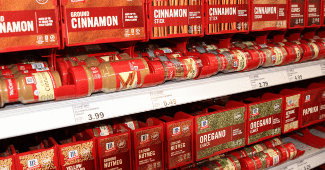Bottles_of_McCormick__Co._spices_on_the_shelf_in_a_grocery_store.png