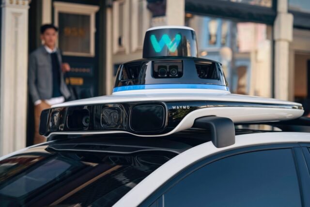 handout-photo-waymo-driverless-taxi-1055234390.jpg
