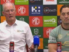 El entrenador de los South Sydney Rabbitohs, Wayne Bennett, ruega a los fanáticos que no irrumpan en el campo mientras Alex Johnston rompe el récord de puntuación