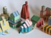Explora una ciudad en crecimiento de edificios de papel en miniatura meticulosamente diseñados por Charles Young: enormes
